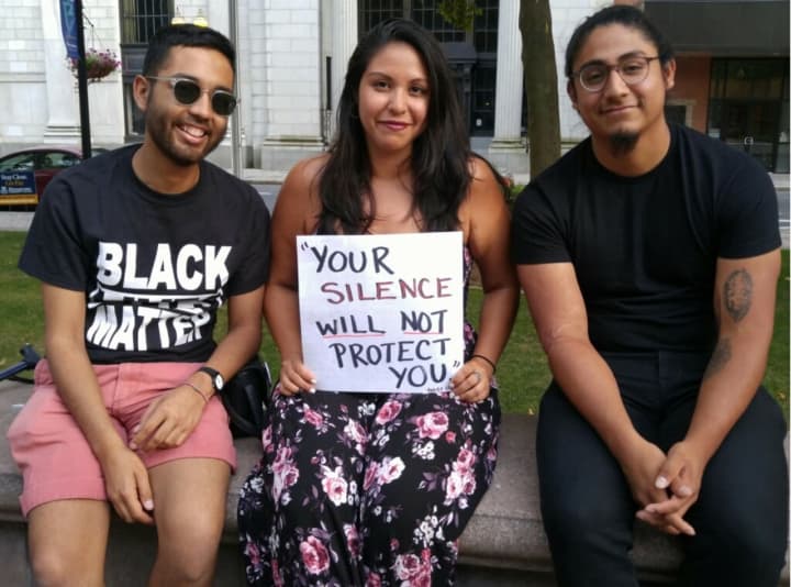 Three of the participants at the vigil in Bridgeport on Sunday to protest violence in Charlottesville share a message.