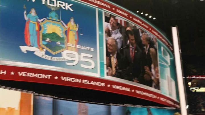 New York gave Donald Trump the votes he needed to become the GOP nominee for president as he got 89 of the 95 delegates from his home state. The Jumbotron in the Quicken Loans Arena broadcast the moment to the entire crowd.
