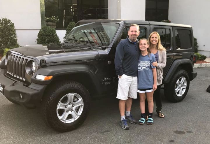 Suffern&#x27;s Traci Myhal and her family with her brand new Jeep Wrangler.