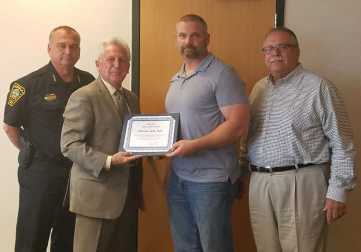 Detective John Bell was named the Norwalk Police Department May 2017 Officer of the Month for his work investigating an opioid overdose death.