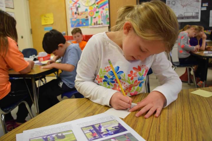 Students practice note-taking at Bronxville Elementary School.