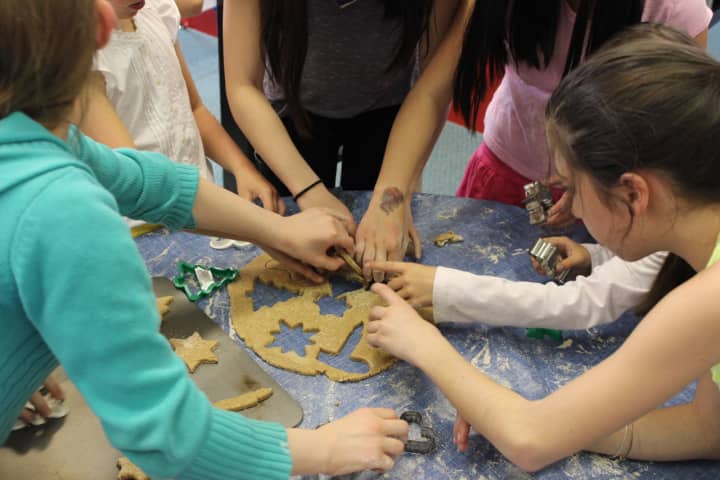Local children cut out homemade dog biscuits to give to homeless animals. This year&#x27;s workshop will be on Tuesday, May 24, from 4:30-5:30 p.m. in the Children&#x27;s Department at Pequot Library.