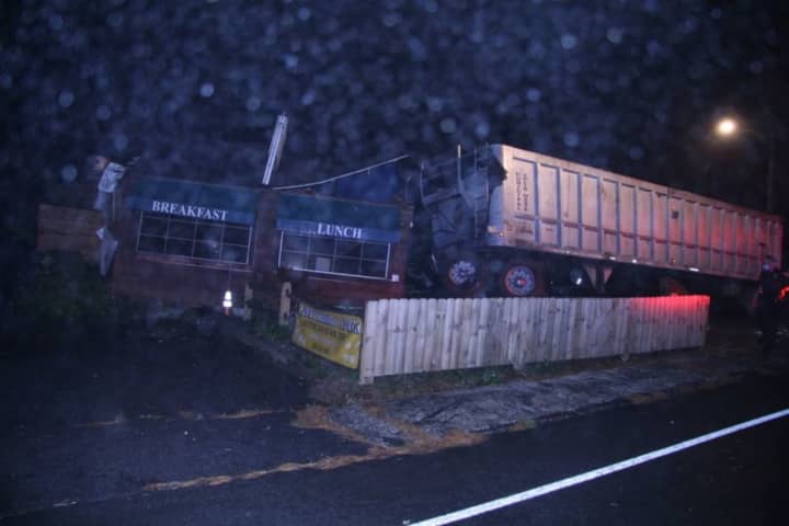 A photo of the tractor-trailer after it struck the side of King&#x27;s Restaurant in Newtown.