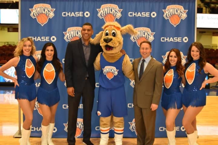 County Executive Rob Astorino and Westchester Knicks GM Allan Houston flank the Westchester Knicks&#x27; new mascot, Hudson, on Friday.