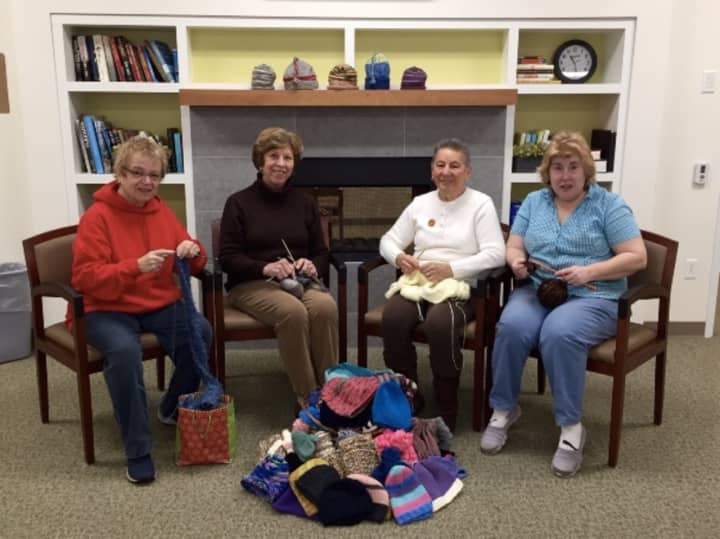 Cathy Oberle, Norma Gerwig, Elsie Ferrara, Deborah Couzzo of Darien&#x27;s Community Knitting and Crochet Group. Not shown: Chris Cronin, NancyJo Rambush, Fran DeAngelis, and Emily Canau