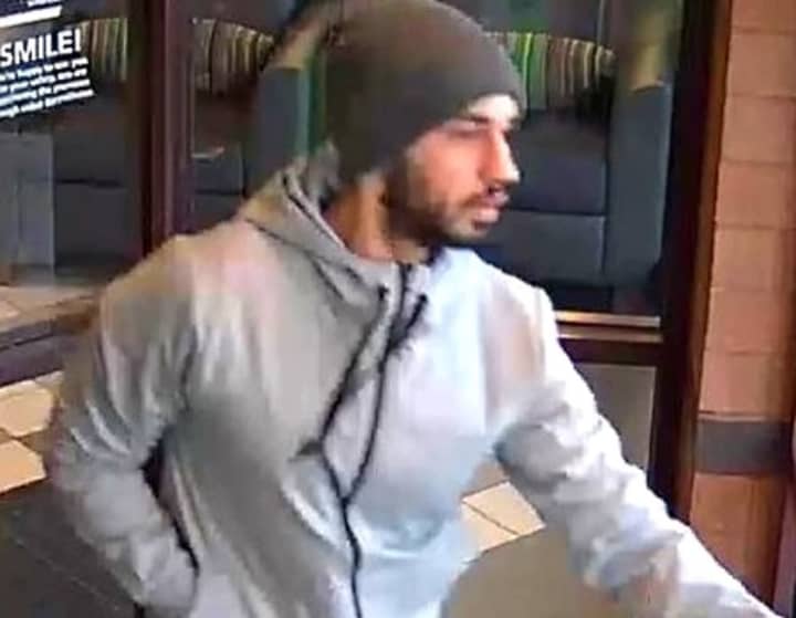 The robber was described as in his 20s, about 5-foot-10 and wearing blue jeans, work boots, and a dark gray wool hat along with the hooded sweatshirt.