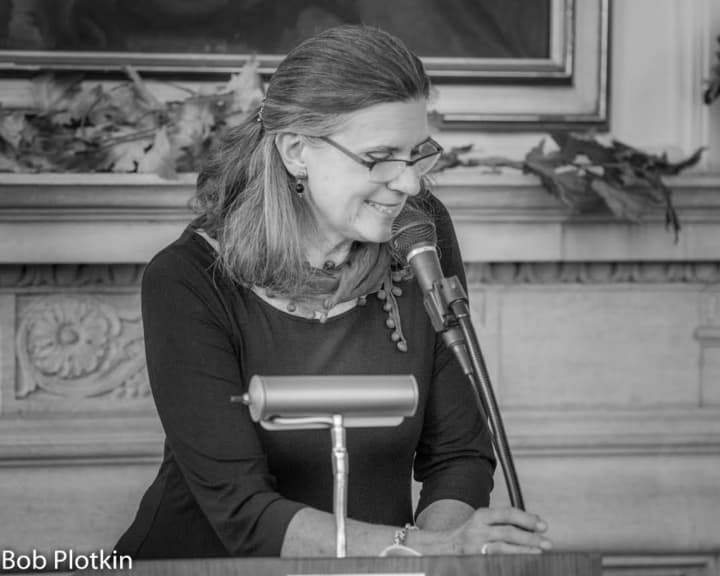 Lisa Olsson reads one of her works at November&#x27;s poetry reading at the Warner Library in Tarrytown.