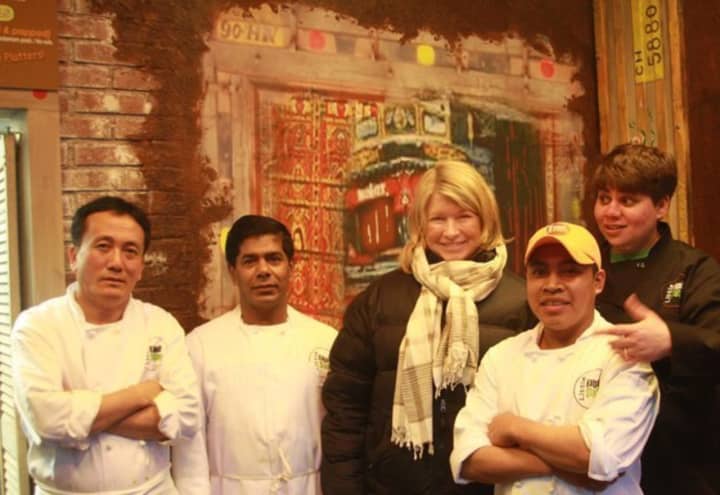 Owner Bonnie Saran, far right, is shown with TV personality Martha Stewart and chefs at Little Kabab Station.