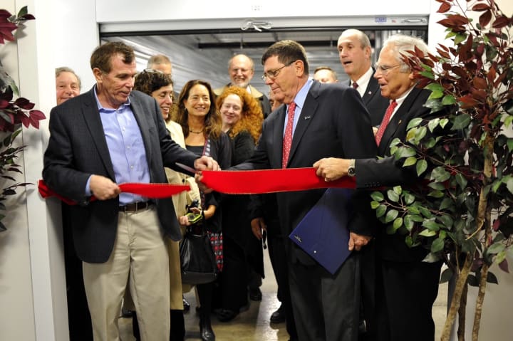 Sean and Chris Murphy along with area officials, share in the ribbon-cutting to open Mamaroneck Self Storage.