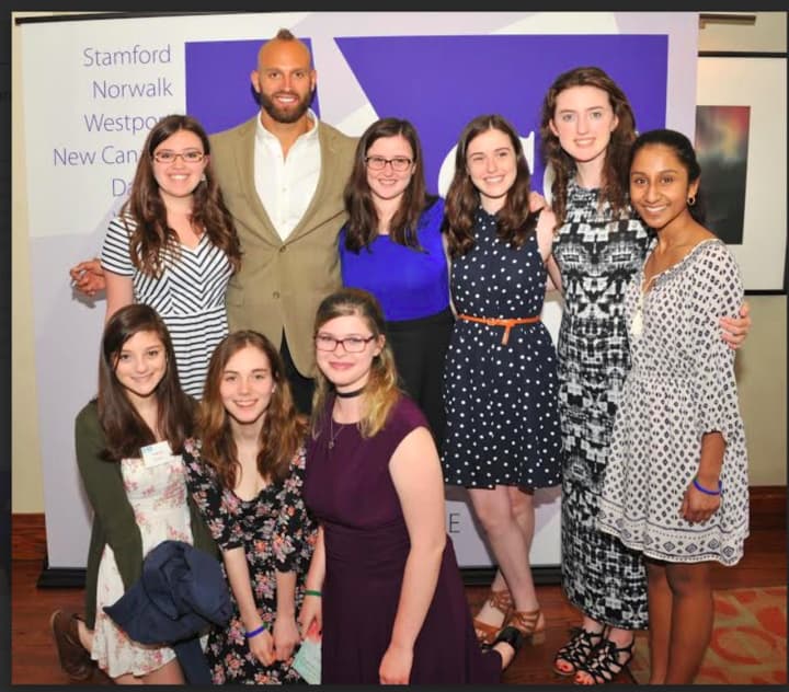 Wilton High School Teen PeaceWorks Club members with New York Giants linebacker Mark Herzlich at the Domestic Violence Crisis Center&#x27;s 14th Annual Voices of Courage Spring Luncheon in May.