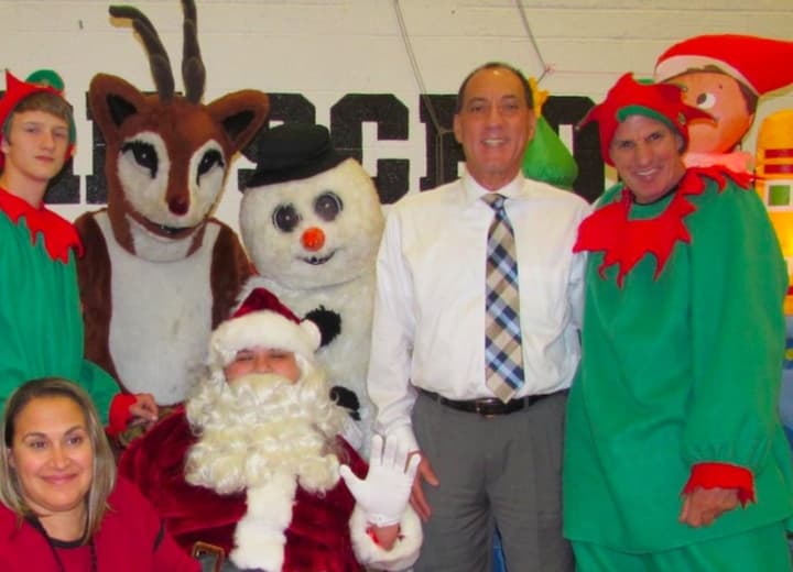 Mayor Thomas Calabrese met with Santa and his elves in Cliffside Park for a school story time. 