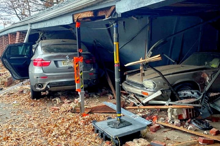 The BMW wagon slammed into the garages at the Elmwood Terrace Apartments, causing substantial front-end damage to the vehicle as well as damage to the garages, shortly after 2:30 p.m. Friday, Nov. 25, Elmwood Park Police Chief Michael Foligno said.