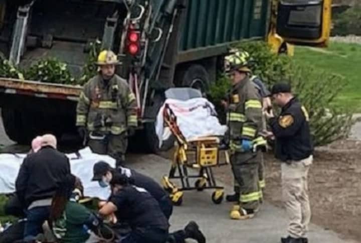 EMS workers tend to the victims.