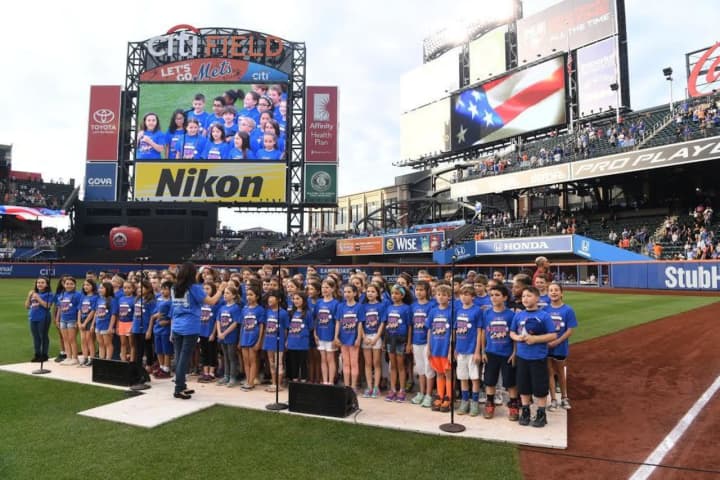 The William E. Cottle Elementary School Chorus singing the national anthem at Citi Field.