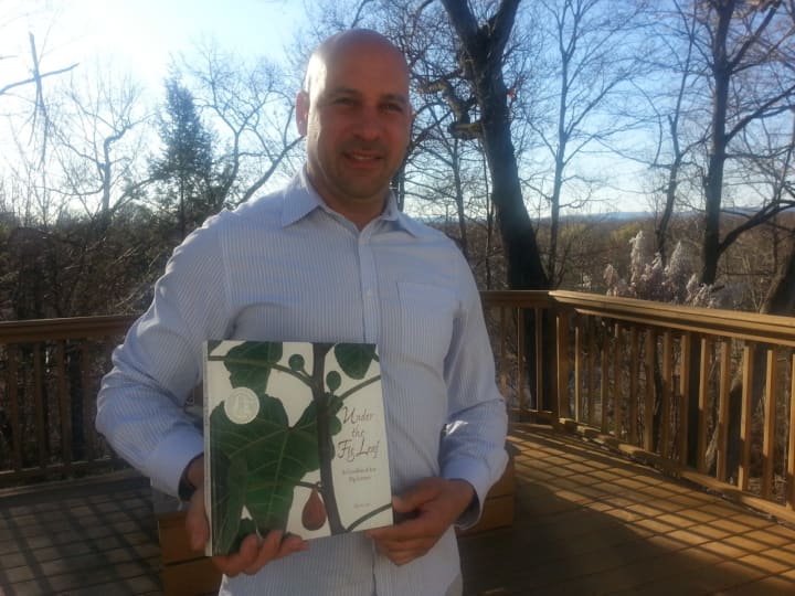 Poughkeepsie resident Michael Fanelli with his favorite fig cookbook.