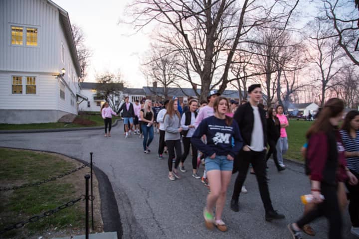 Participants walk during the Millbrook School&#x27;s annual &quot;Relay for Life,&quot; an event that raised $5,000 for cancer research.