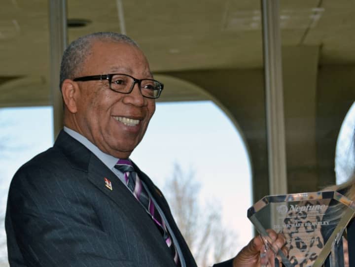 Former Neptune Township Mayor Michael Brantley receiving an award in 2015.