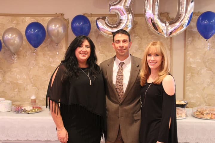 Michael Cocilovo of New City Chiropractic Center celebrated his office’s 30th anniversary. From left is Office Manager Darlene Adams and Risa B. Hoag, Publicist.