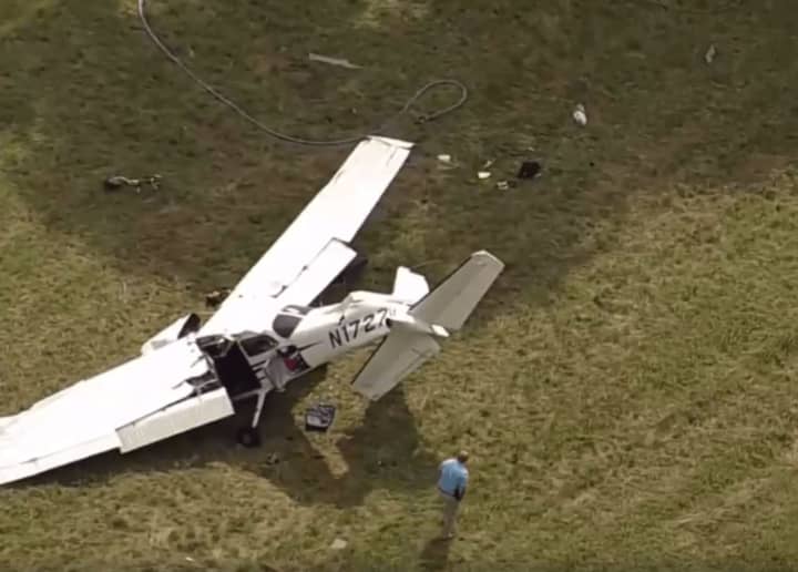 The plane crashed near the Candlelight Farms Airport in New Milford. It had taken off early from Danbury Municipal Airport. Aerial photo courtesy of NBC Connecticut.