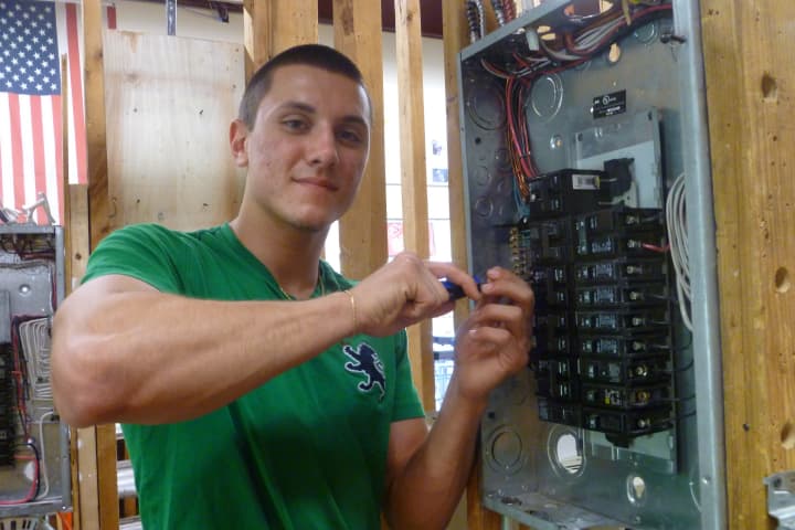 Valhalla High School senior Brandon Agins&#x27; internship with a local security company has sparked a new career in high-tech electrical work.