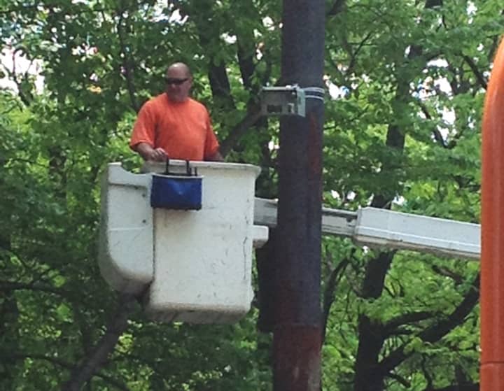The Mount Vernon Department of Public Works installs cameras at the Seventh Street playground.