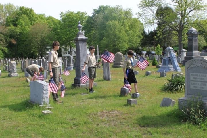 Easton Boy Scouts Adam Farmer, Donald Kochersperger, and Will &amp; Thomas Glatzel helped American Legion Post 160 replace weather worn and missing flags in preparation for Memorial Day at Union Cemetery.