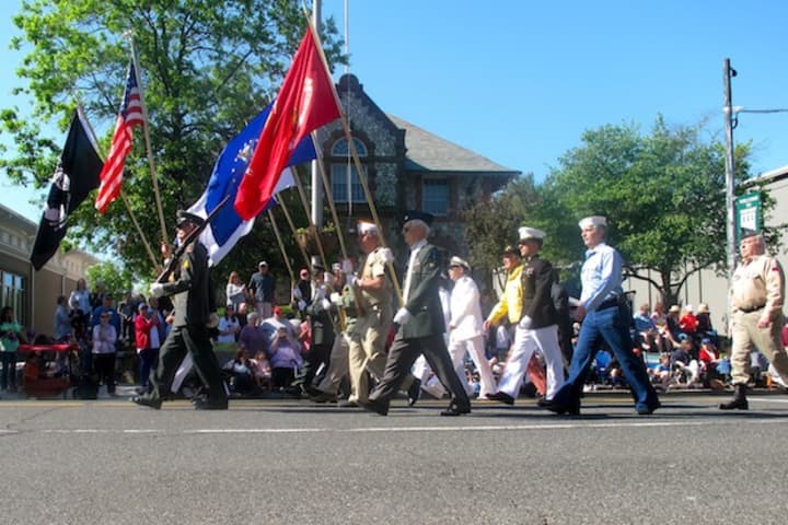 The theme of this year&#x27;s parade in Westport is remembering Prisoners of War and Missing in Action, as reflected in the flags. 