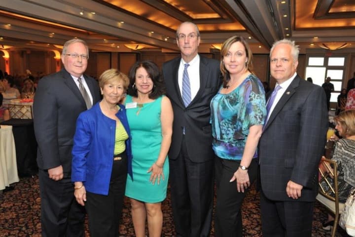 Attending the fashion show (left to right) were George Oros, Chief of Staff, Westchester County;  Ann Garti, HGMLS COO; Carol Christiansen, WCR President: Kevin Plunkett, Deputy Westchester County Executive; Katheryn DeClerck, HGAR President; and Rus