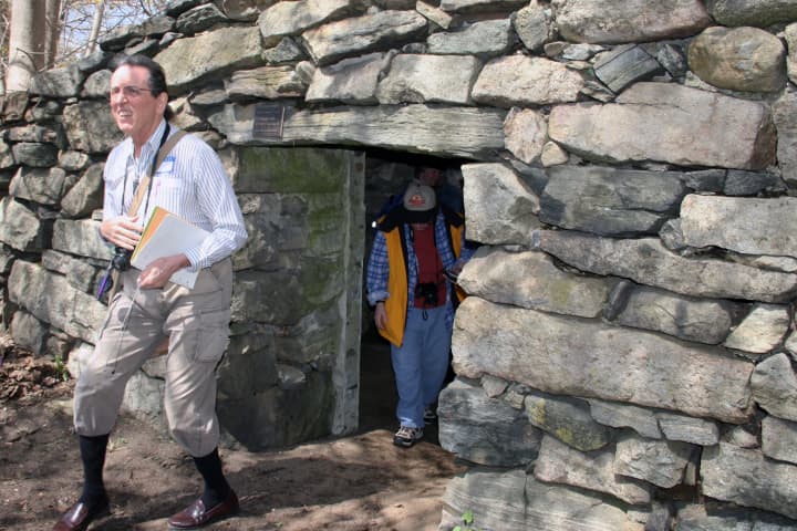 Archeological researcher David Johnson (left) conducted a tour of North Salem&#x27;s stone chambers and cairns.