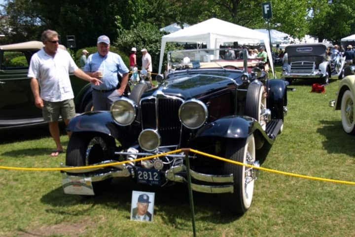 Glenn Royals (right) shows off his late father&#x27;s 1932 Cord L-29 at the Concours d&#x27;Elegance in Greenwich Saturday.