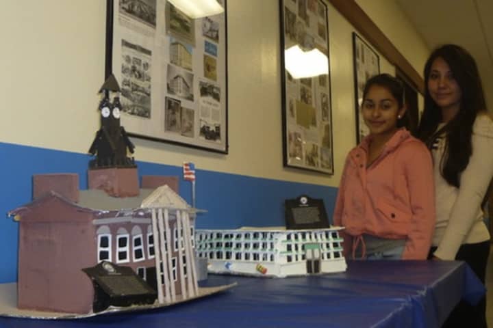 Port Chester Middle School students show off a model they made for last year&#x27;s National Arts in the School Day. This year the celebration will be held Thursday across the district.