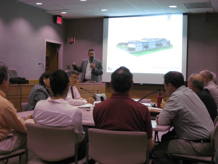 Conifer architect Steve Schoch presented the latest affordable housing concept to two New Castle boards Tuesday night.