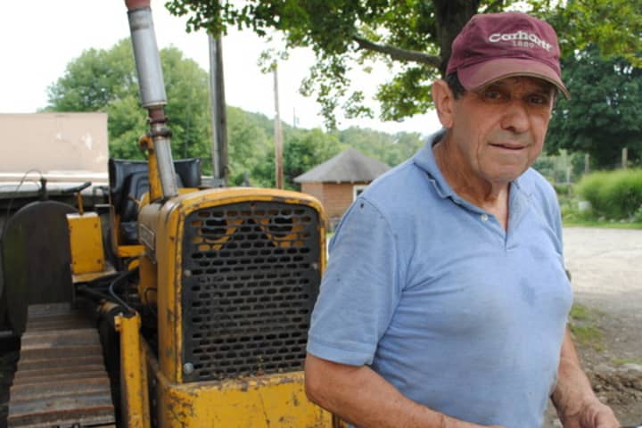 Farmer John DeMaria at Hemlock Hill Farm in Cortlandt Manor. Several Westchester businesses are helping raise funds for the farm that was destroyed by a fire in April. 