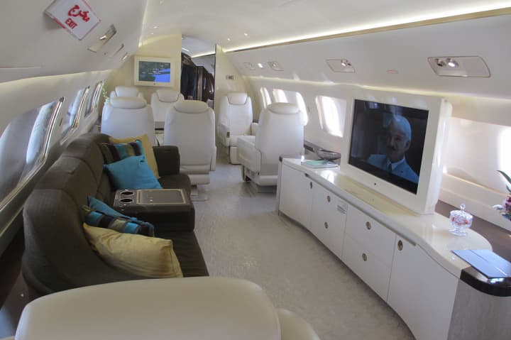 The Embraer Lineage 1000 can be configured to have a queen-size bed, flat screens and a shower, among other things. 