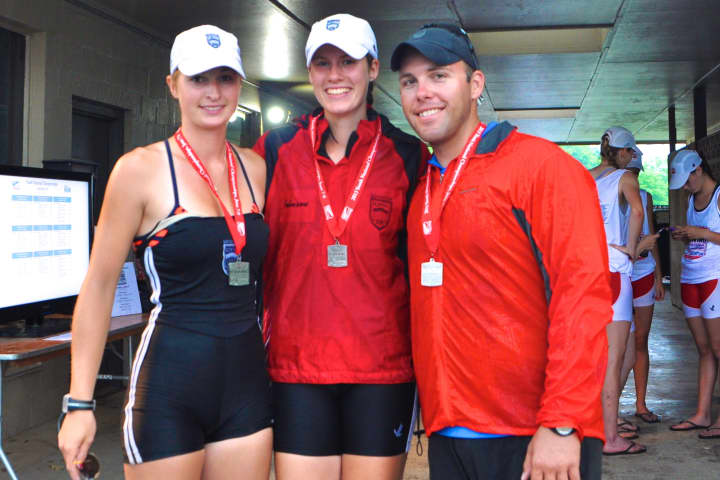 Saugatuck Rowing Club&#x27;s Women&#x27;s 2x team, Jo Gurman of Weston and Christina Johnson of Redding, stand with coach Chase Graham after winning a silver medal at nationals.