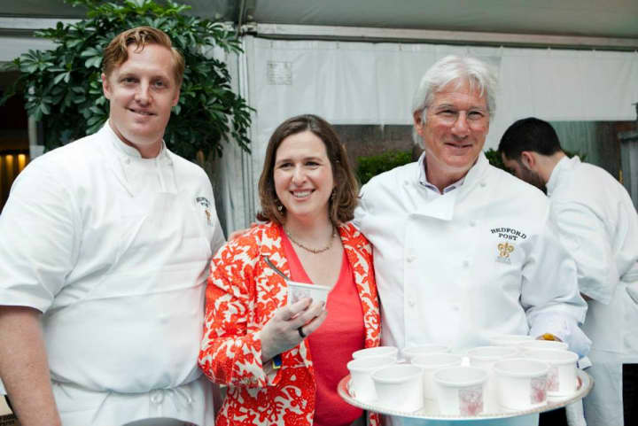 Bedford Post Inn chef Jeremy McMillan (left) and the inn&#x27;s co-owner Richard Gere (right), stand with Citymeals Executive Director Beth Shapiro.