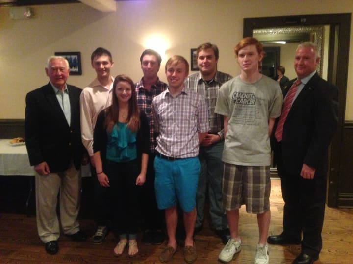 Six of the eight Mary Denning Scholarship recipients pose with the late Denning&#x27;s husband and son in Eastchester.