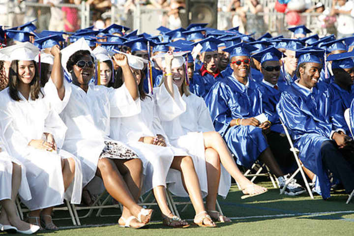 Members of the Class of 2010 at Brien McMahon High School in Norwalk enjoying their graduation. This year&#x27;s class of current seniors at BMHS and Norwalk High graduate Friday.