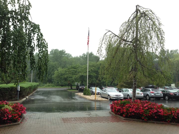 Rain was falling and the sky was dark in Armonk Monday morning.