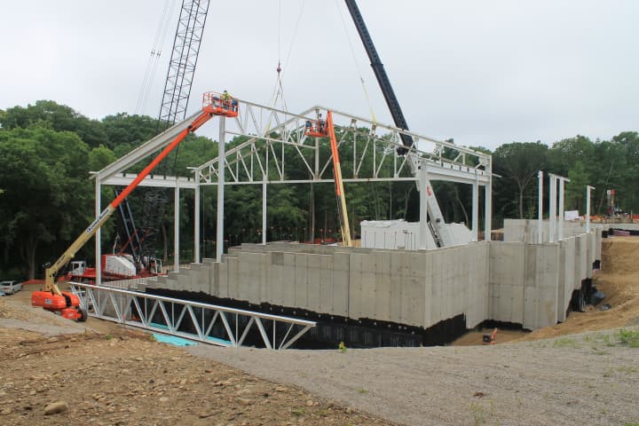 This photo the new facility under construction at the Westport Weston Family Ys Mahackeno campus was taken from the northeast corner of the building and shows the steel trusses being hoisted into place.