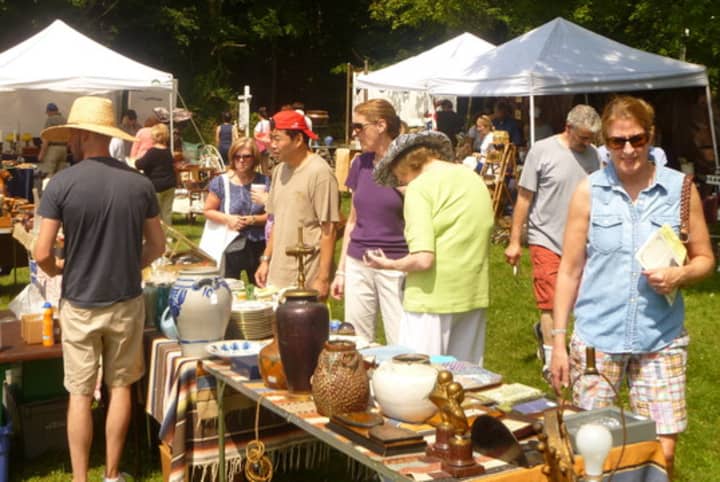 Attendees check out the merchandise at Antiques in the Church Yard in South Salem.