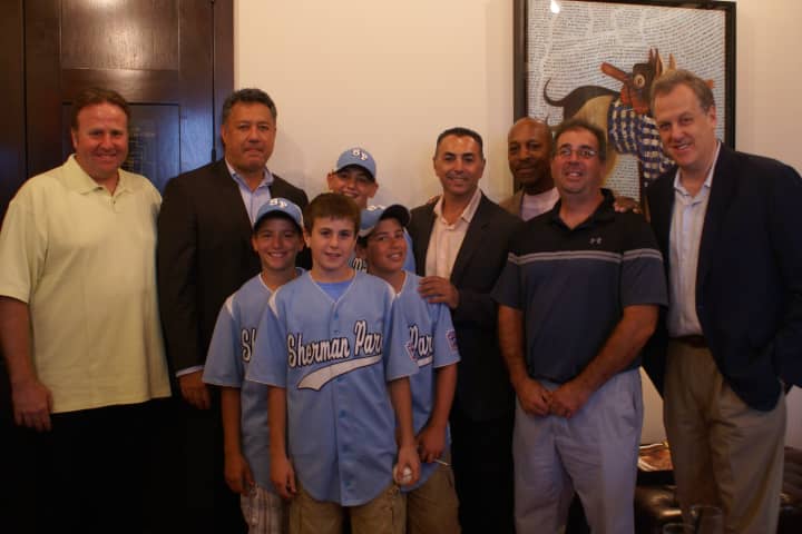 Members of the Sherman Park Little League team meet with Yankees and Mets legends at the inaugural Legacy Agency Breakfast of Champions, held on Monday.