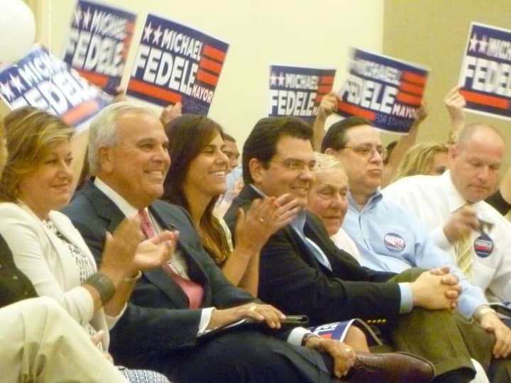 Former Lt. Gov. Michael Fedele, second from left, celebrates with his wife, Carol, and other supporters of his mayoral campaign after receiving the endorsement from the Stamford Republican Town Committee. 