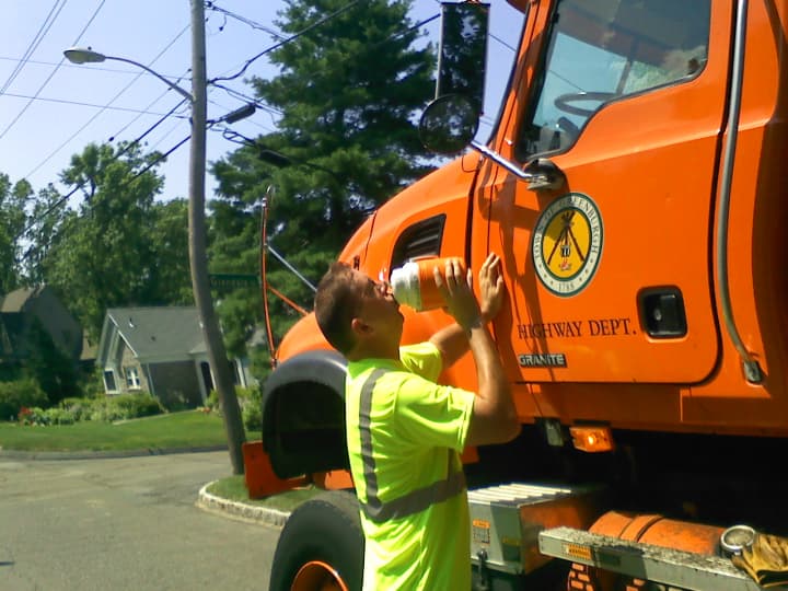 Greenburgh Highway Department workers fought the heat on the job Wednesday.