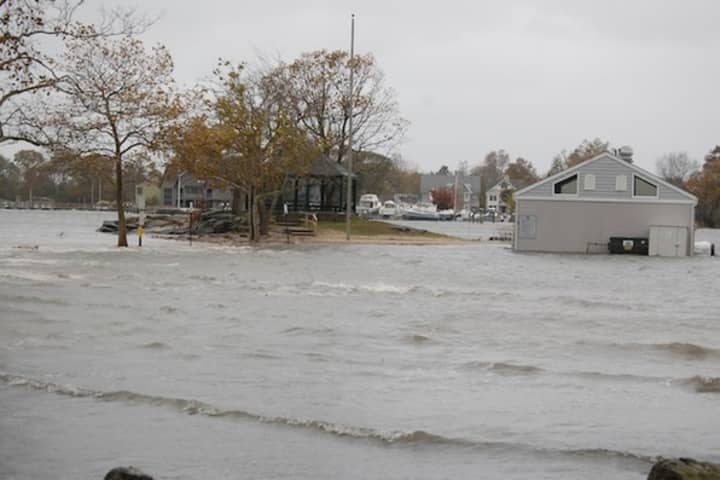Pear Tree Point Beach in Darien is under flowing water at high tide during Hurricane Sandy. At least 76 homes in town were damaged in that storm. 