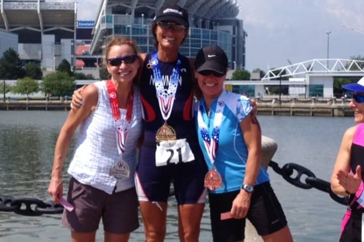 Karen Newman of Greenwich won the National Senior Games triathlon Sunday in Cleveland.