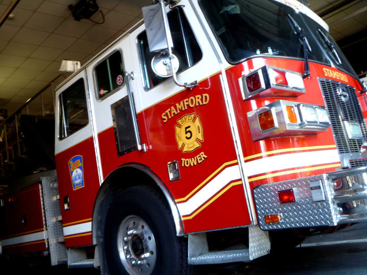 Stamford firefighters said a local man suffered burns while using gasoline to clear weeds in his yard.