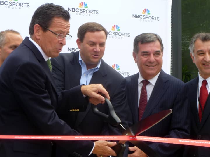 Gov. Dannel Malloy, Chairman of NBC Sports Mark Lazarus and Mayor Michael Pavia cut the ribbon officially opening NBC Sports International Broadcast Center in Stamford. 