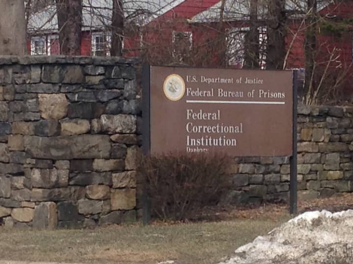 Only the signs are visible from the road for the Federal Correctional Institution in Danbury. 
