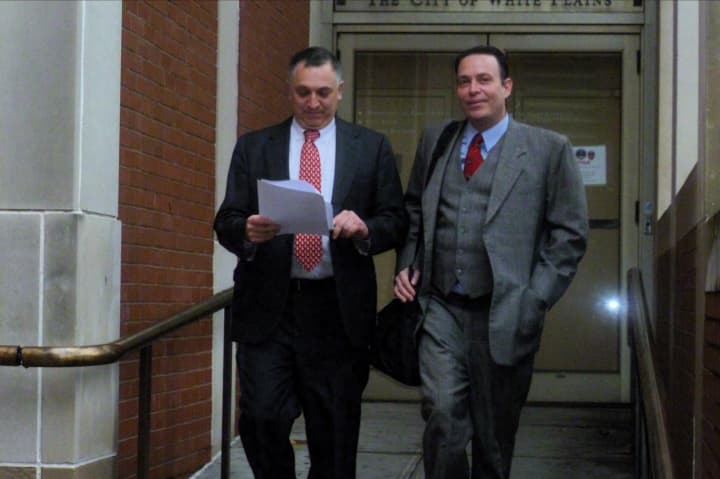 Former White Plains Mayor Adam Bradley, left, seen here with his lawyer Randall Cutler, will debut a new radio talk show on Wednesday.
